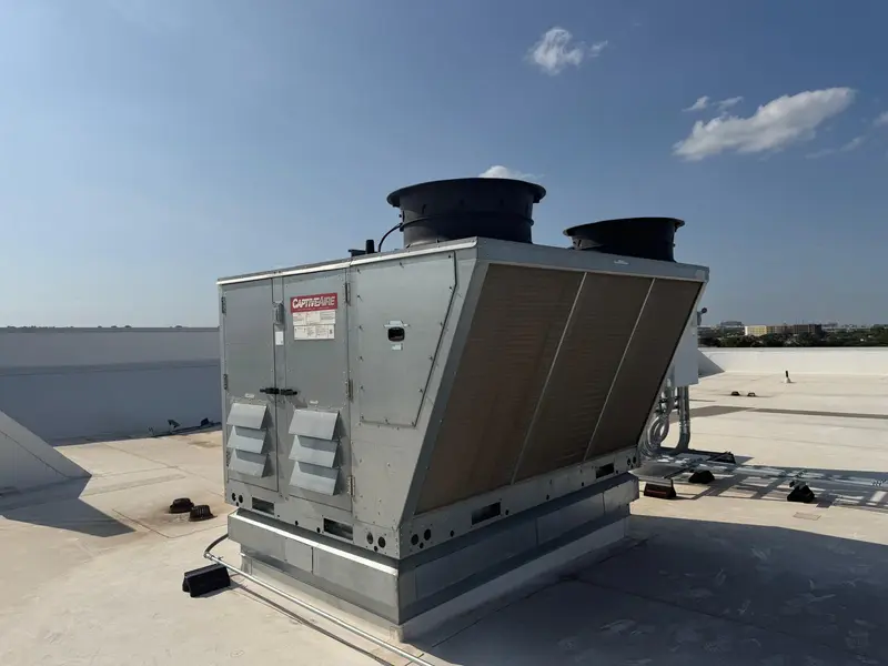 Packaged rooftop unit on a client's commercial roof in Austin, Texas